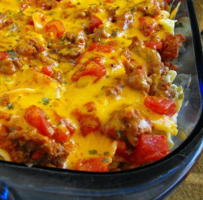 This Beef Lombardi is a hearty casserole with ground beef, egg noodles, cream cheese, tomatoes and tons of flavor!!!