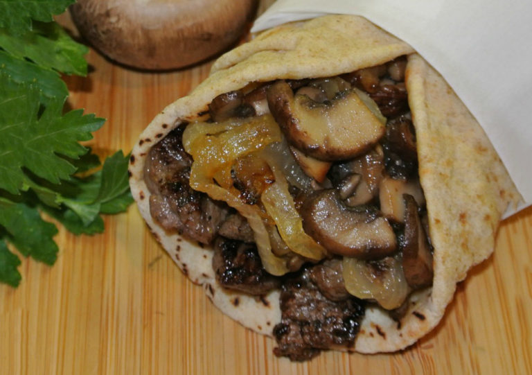 STEAK AND CHEESE SANDWICHES WITH ONIONS AND MUSHROOMS