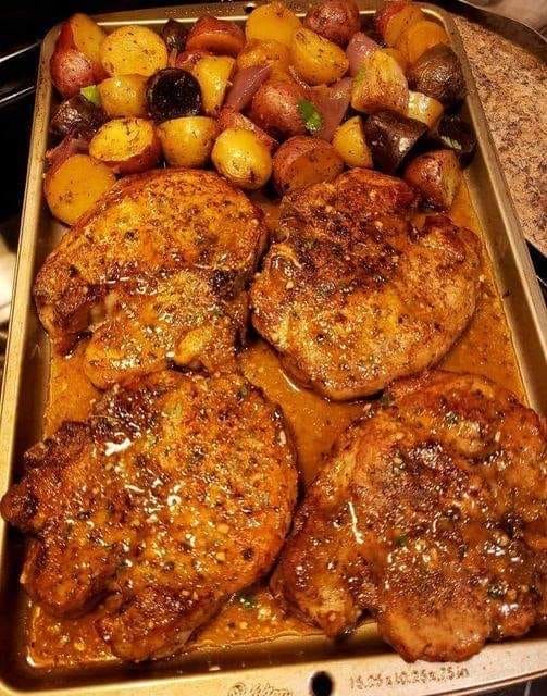 Sheet pan pork chops with multi colored potatoes & red onion